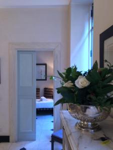 ローマにあるLa Casa In Vetrinaの花瓶