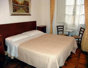 Postel nebo postele na pokoji v ubytování Albergo San Giovanni