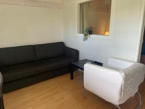 Posezení v ubytování Kapelludden Östra Öland
