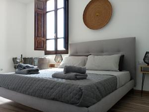 Postel nebo postele na pokoji v ubytování NIU Rooms