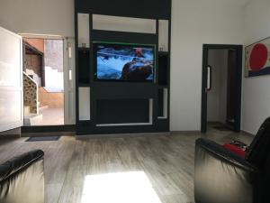 TV a/nebo společenská místnost v ubytování Villa de Ingenio JAVAZU