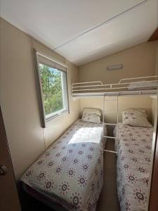 Camping La Tuque客房内的一张或多张床位