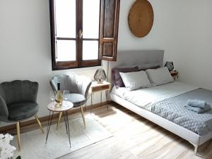 Postel nebo postele na pokoji v ubytování NIU Rooms