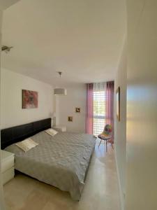 Postel nebo postele na pokoji v ubytování Residencia Lucia