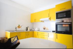 Kuchyňa alebo kuchynka v ubytovaní Magnifique bas de villa Émeraude