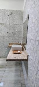 a bathroom with a sink and a shower at Bons Aires in Atins +12 photos