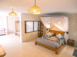 Posteľ alebo postele v izbe v ubytovaní CoCo Breeze Spa Hotel