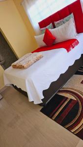 Uma cama ou camas num quarto em Goodlife guest house in klerksdorp