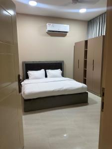 Postel nebo postele na pokoji v ubytování Baytna Hotel Apartments بيتنا للشقق الفندقية