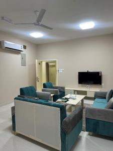 TV a/nebo společenská místnost v ubytování Baytna Hotel Apartments بيتنا للشقق الفندقية