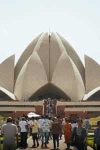 a crowd of people walking in front of a building at Hotel GL House For Family and Foreign Guests Near Delhi Airport in New Delhi
