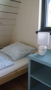 Letto o letti in una camera di Domek nad Jeziorem Kaszuby max 6 os