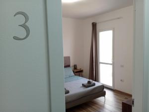 Postel nebo postele na pokoji v ubytování NIU Rooms