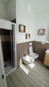 Koupelna v ubytování Casa Vacanza Aurora + 20 fotografií