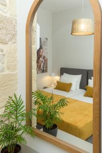Ένα ή περισσότερα κρεβάτια σε δωμάτιο στο Villa Savina