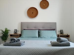 Postel nebo postele na pokoji v ubytování NIU Rooms