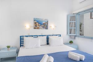Postel nebo postele na pokoji v ubytování Pico Bello Patmos 14
