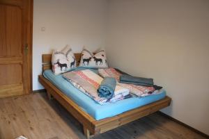Postel nebo postele na pokoji v ubytování Appartement Demelfischer am See