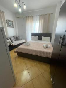 Postel nebo postele na pokoji v ubytování Vila K&M