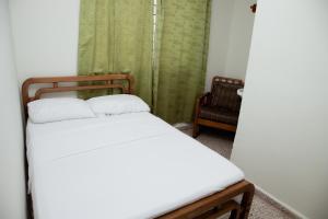 Letto o letti in una camera di Hotel Casa Verde Guatapé