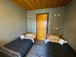 Postel nebo postele na pokoji v ubytování Hostel Kalameeste Maja