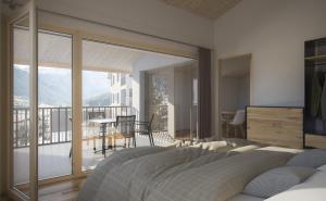 Кровать или кровати в номере Residenza Grava Ferienwohnungen operated by JUFA Hotel Savognin