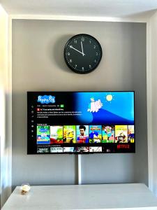 TV a/nebo společenská místnost v ubytování apartmant Adrian Vista Taurito