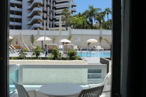 The swimming pool at or close to Apartamentos Fayna