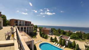 a view of a resort with a swimming pool at William's apartments - fifth amazing studio in Sveti Vlas