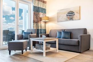 Posezení v ubytování Meerblickvilla Großenbrode Wohnung 21