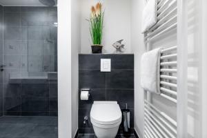 Koupelna v ubytování Meerblickvilla Großenbrode Wohnung 21