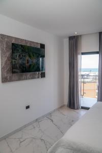Voodi või voodid majutusasutuse Manta Surf Hotel toas