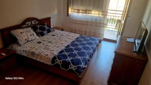 Postel nebo postele na pokoji v ubytování Jani apartment