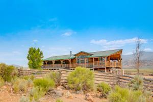 a house in the middle of the desert at Remote Kingston Cabin with Mtn Views Fish and ATV! in Antimony