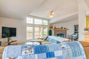 a living room with a couch and a fireplace at Remote Kingston Cabin with Mtn Views Fish and ATV! in Antimony