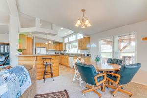 a kitchen and dining room with a table and chairs at Remote Kingston Cabin with Mtn Views Fish and ATV! in Antimony