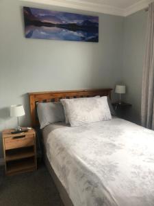 Postel nebo postele na pokoji v ubytování Manorlodge