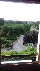 a view of a road from a window at Loft Bellevue in Trôo