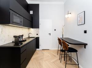 Kuchnia lub aneks kuchenny w obiekcie Wawel Boutique Residence - Krakow Old Town