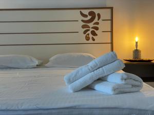 Giường trong phòng chung tại Air Residence 1