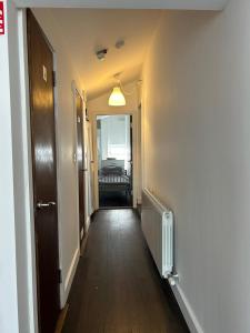 a hallway leading to a room with at Sarsfields Communities in Dolphinʼs Barn +16 photos