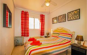 Postel nebo postele na pokoji v ubytování Amazing Apartment In Ciudad Quesada