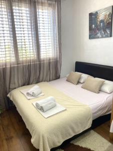 Postel nebo postele na pokoji v ubytování SOL guest house + 4 fotografie