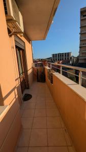 a balcony of a building with a view of a city at visitShkoder - Noel's Home in Shkodër