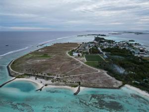an aerial view of an island in the ocean at LETS GO HURAA in Huraa
