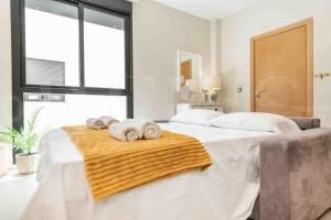 Posteľ alebo postele v izbe v ubytovaní Adorable flat with private parking in the center by REMS