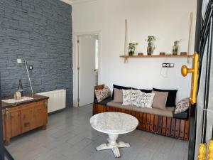 a living room with a couch and a table at Casa Tanger in Tangier