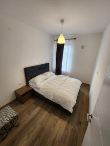 Letto o letti in una camera di New Lux