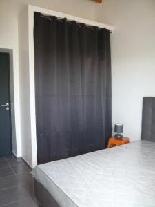 Postel nebo postele na pokoji v ubytování Le Fief de Belmont