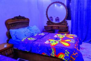 Postel nebo postele na pokoji v ubytování Deluxe villa Gardenia Pyramids